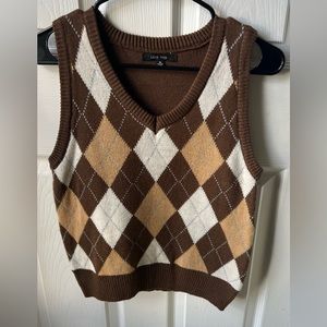 Sweater vest from Tilly’s. Size medium. Great condition, barely warn.